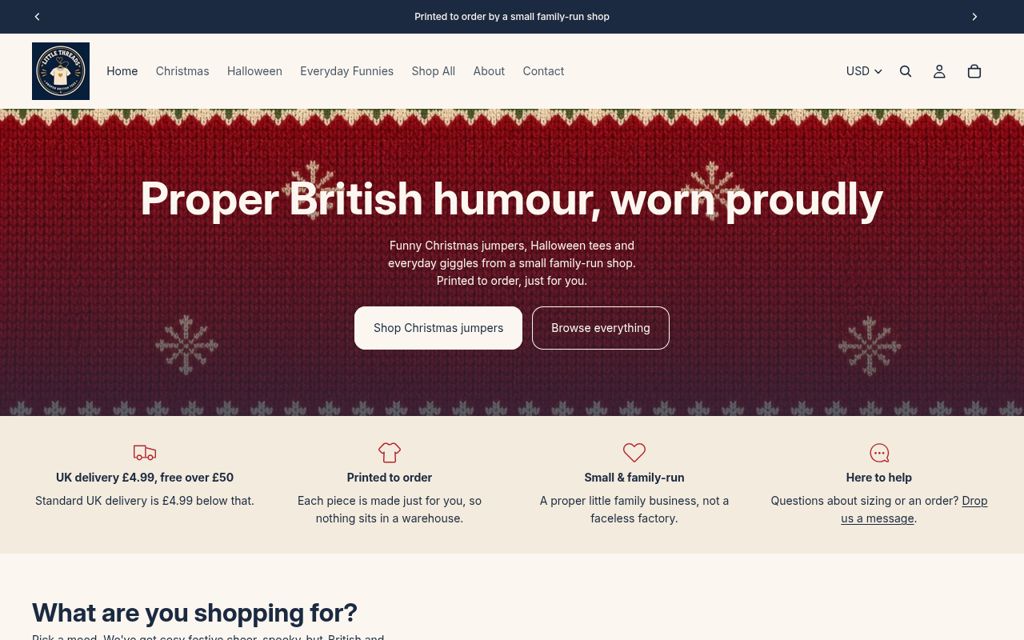 The Little Threads shop homepage on a laptop: a red knitted Christmas jumper banner reading 'Proper British humour, worn proudly' with a 'Shop Christmas jumpers' button.